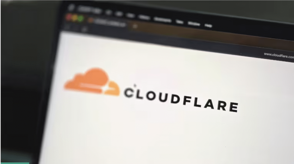 Cloudflare logo on a laptop screen illustration